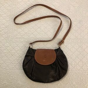 Italian black and brown leather crossbody saddle bag purse.